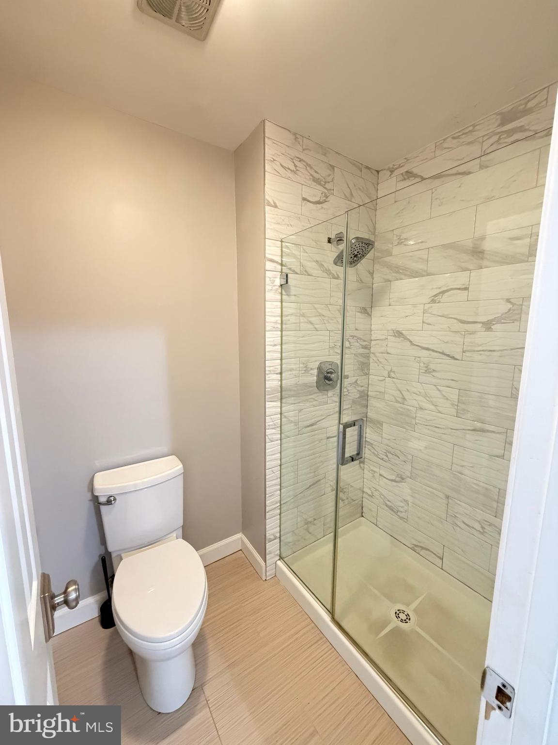 12629 English Orchard Court Silver Spring, MD 20906 - Photo 13 of 31 a bathroom with a toilet and a shower