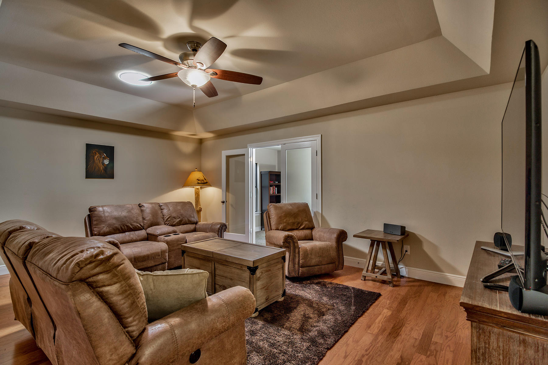2884 Silverhill Road Crestview, FL 32536 - Photo 12 of 16 a living room with furniture and a chandelier