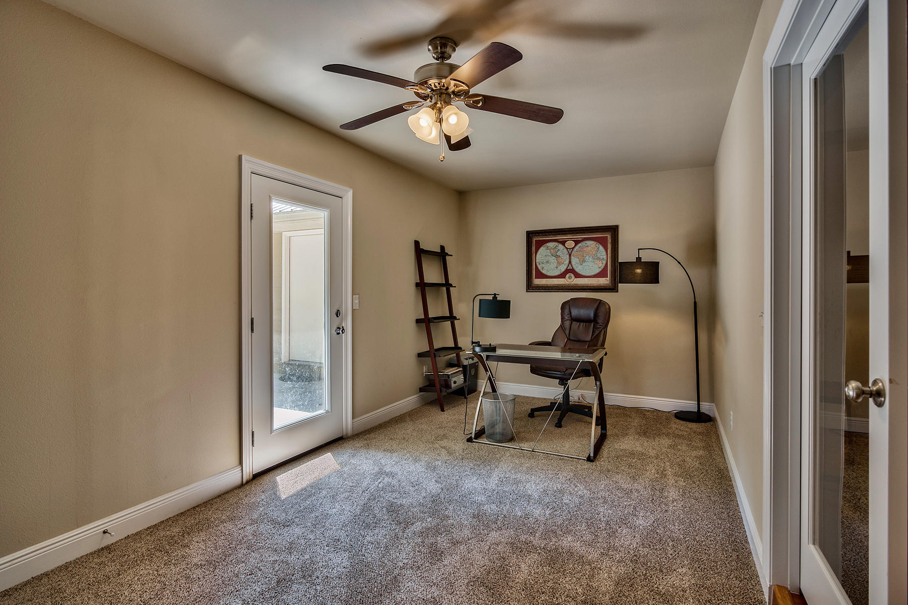 2884 Silverhill Road Crestview, FL 32536 - Photo 14 of 16 a work room with furniture and a ceiling fan