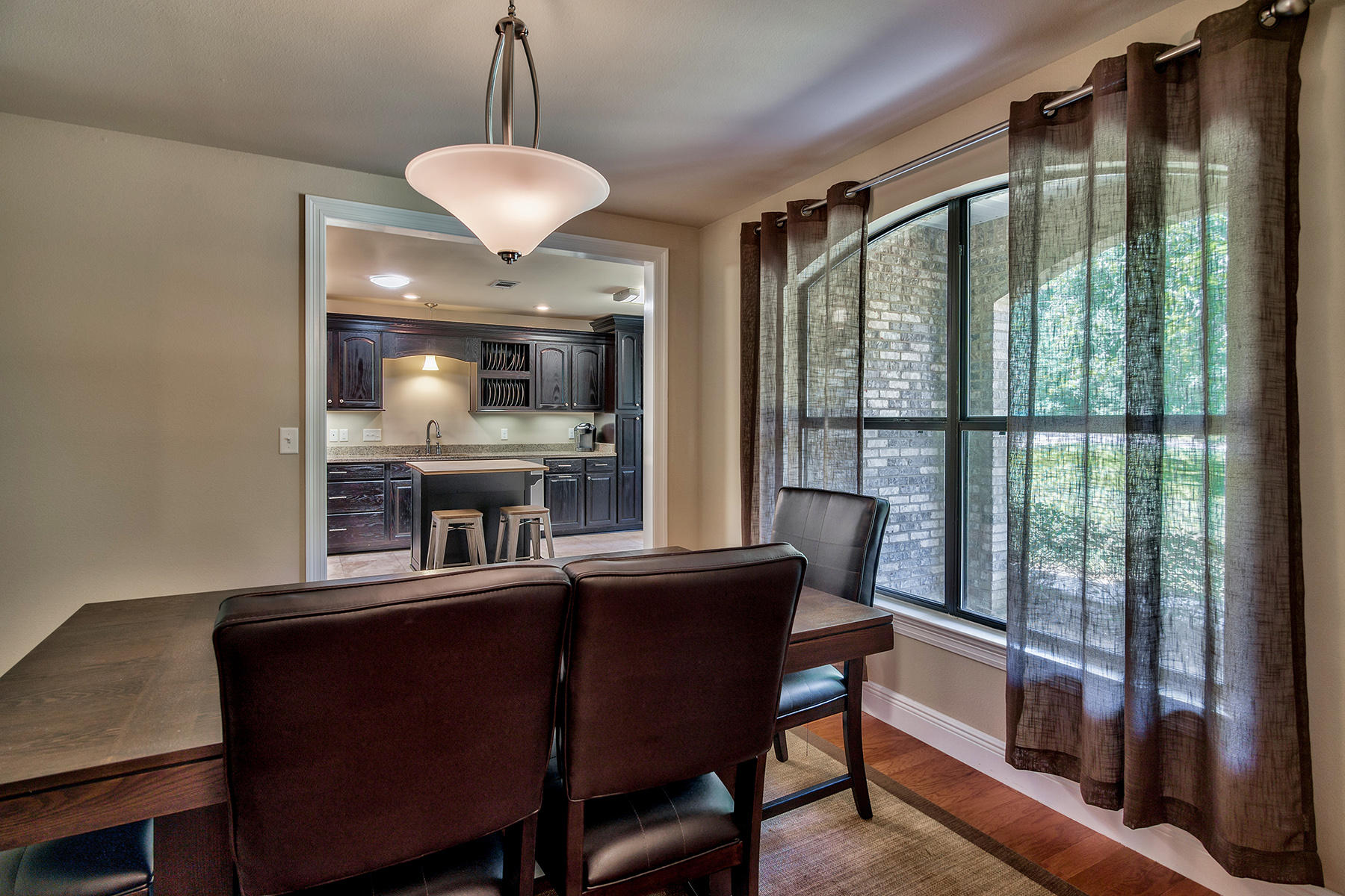 2884 Silverhill Road Crestview, FL 32536 - Photo 8 of 16 a dining room with furniture and window