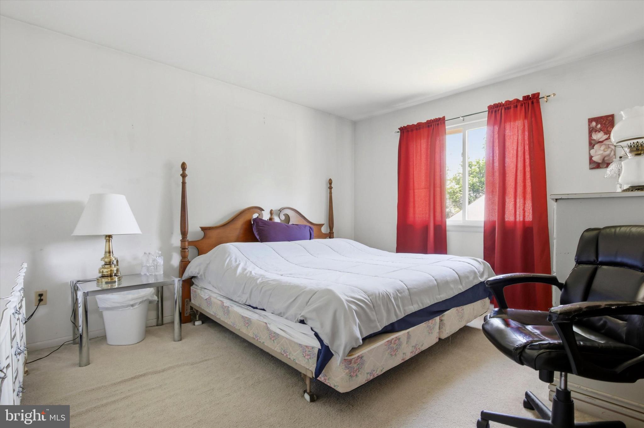 1265 Old York Road Warminster, PA 18974 - Photo 14 of 35 a bedroom with a bed and a chair