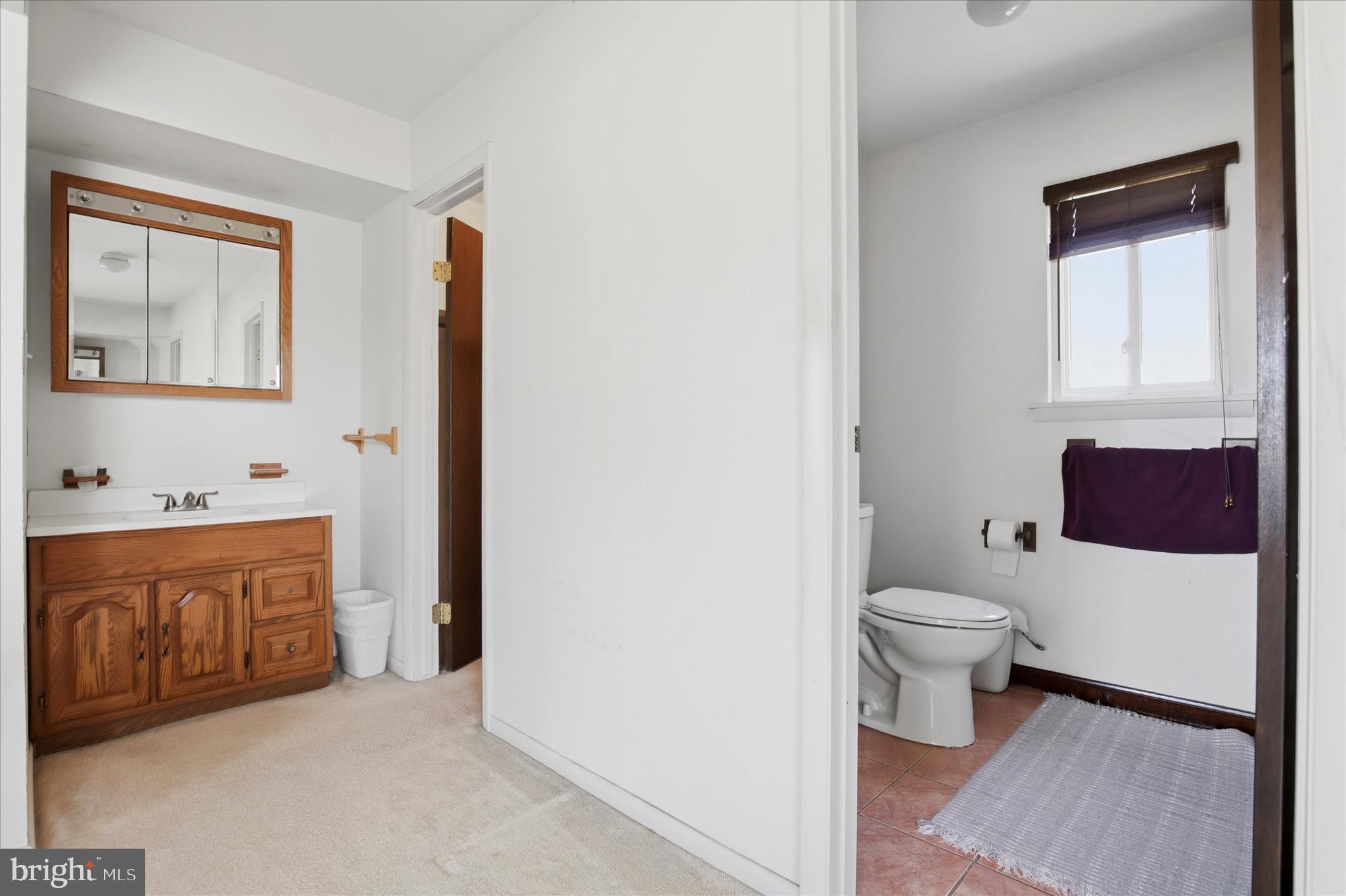 1265 Old York Road Warminster, PA 18974 - Photo 17 of 35 a bathroom with a sink a toilet and shower