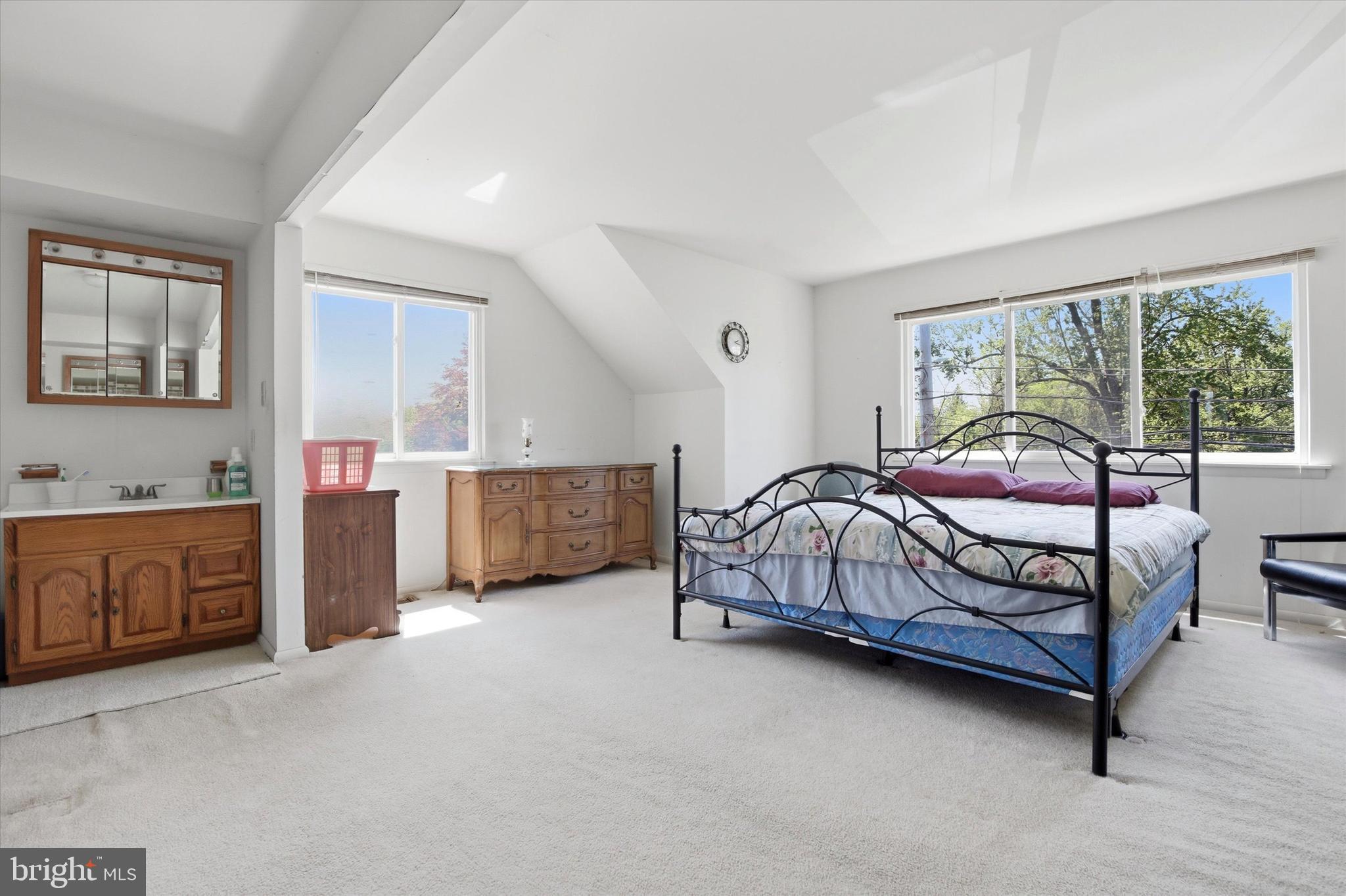 1265 Old York Road Warminster, PA 18974 - Photo 18 of 35 a bedroom with a bed and a dresser