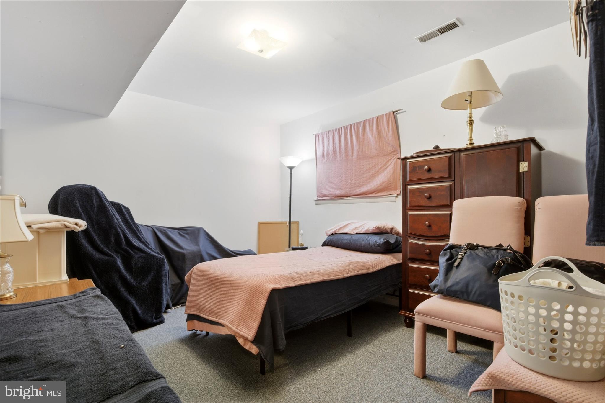 1265 Old York Road Warminster, PA 18974 - Photo 23 of 35 a bedroom with bed and a lamp
