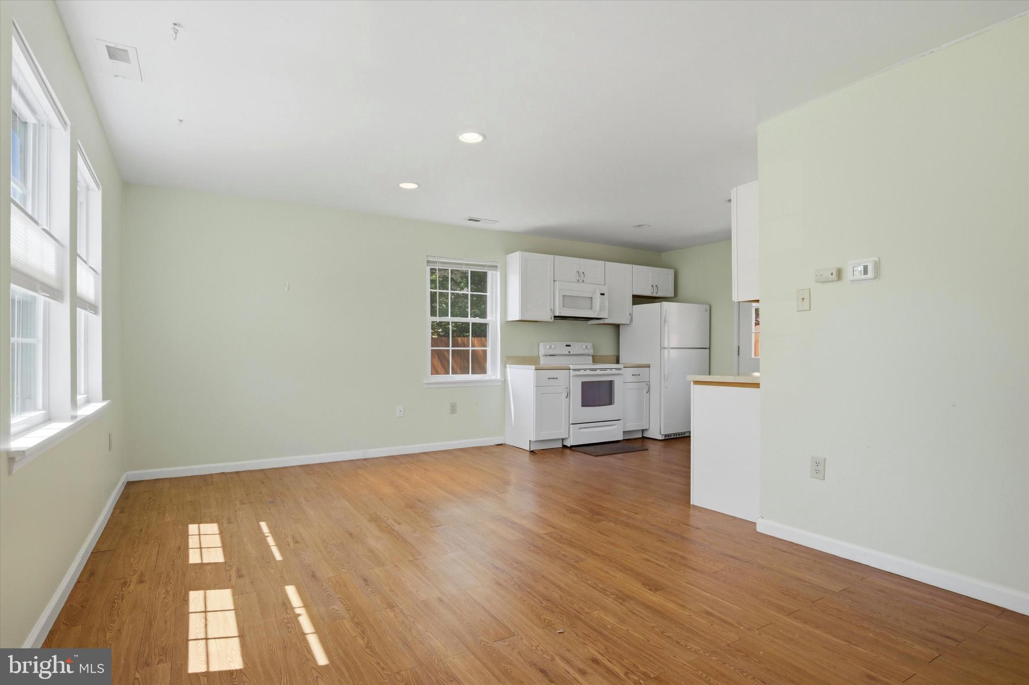 1265 Old York Road Warminster, PA 18974 - Photo 26 of 35 a view of a kitchen with wooden floor and electronic appliances