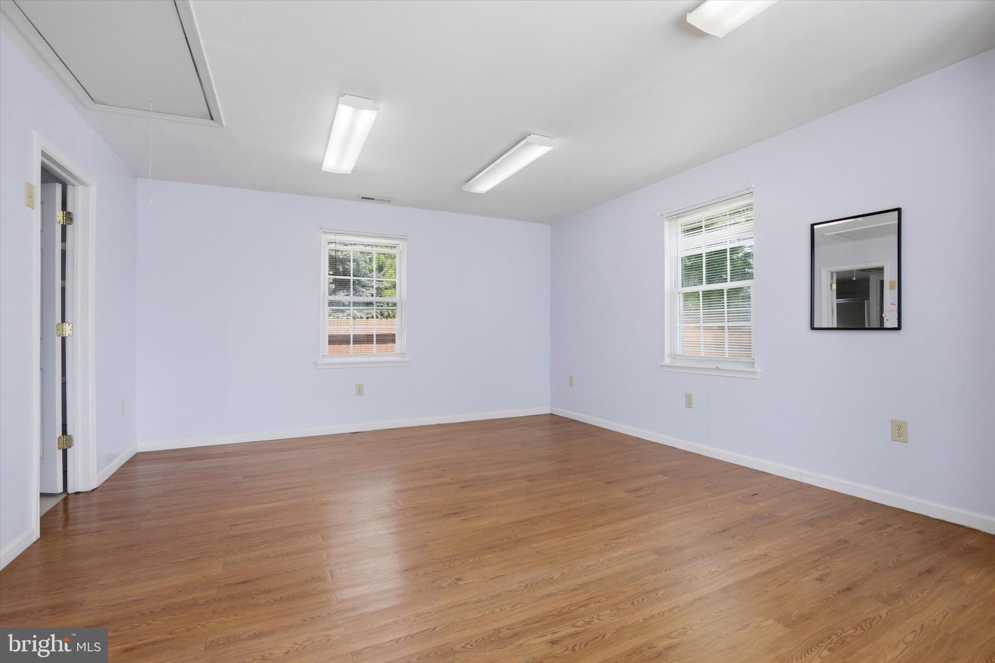1265 Old York Road Warminster, PA 18974 - Photo 29 of 35 an empty room with wooden floor and windows