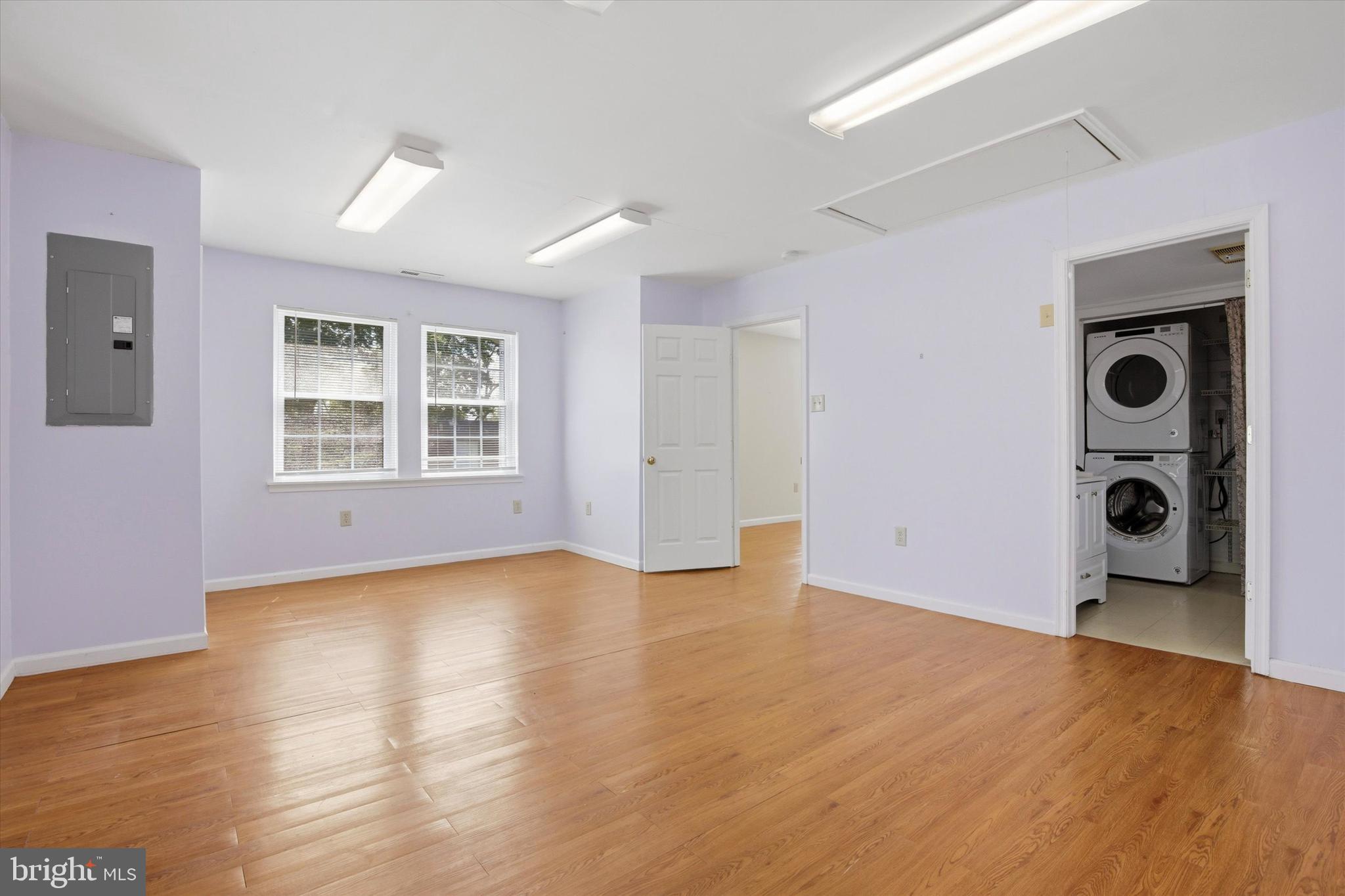 1265 Old York Road Warminster, PA 18974 - Photo 30 of 35 an empty room with wooden floor and windows