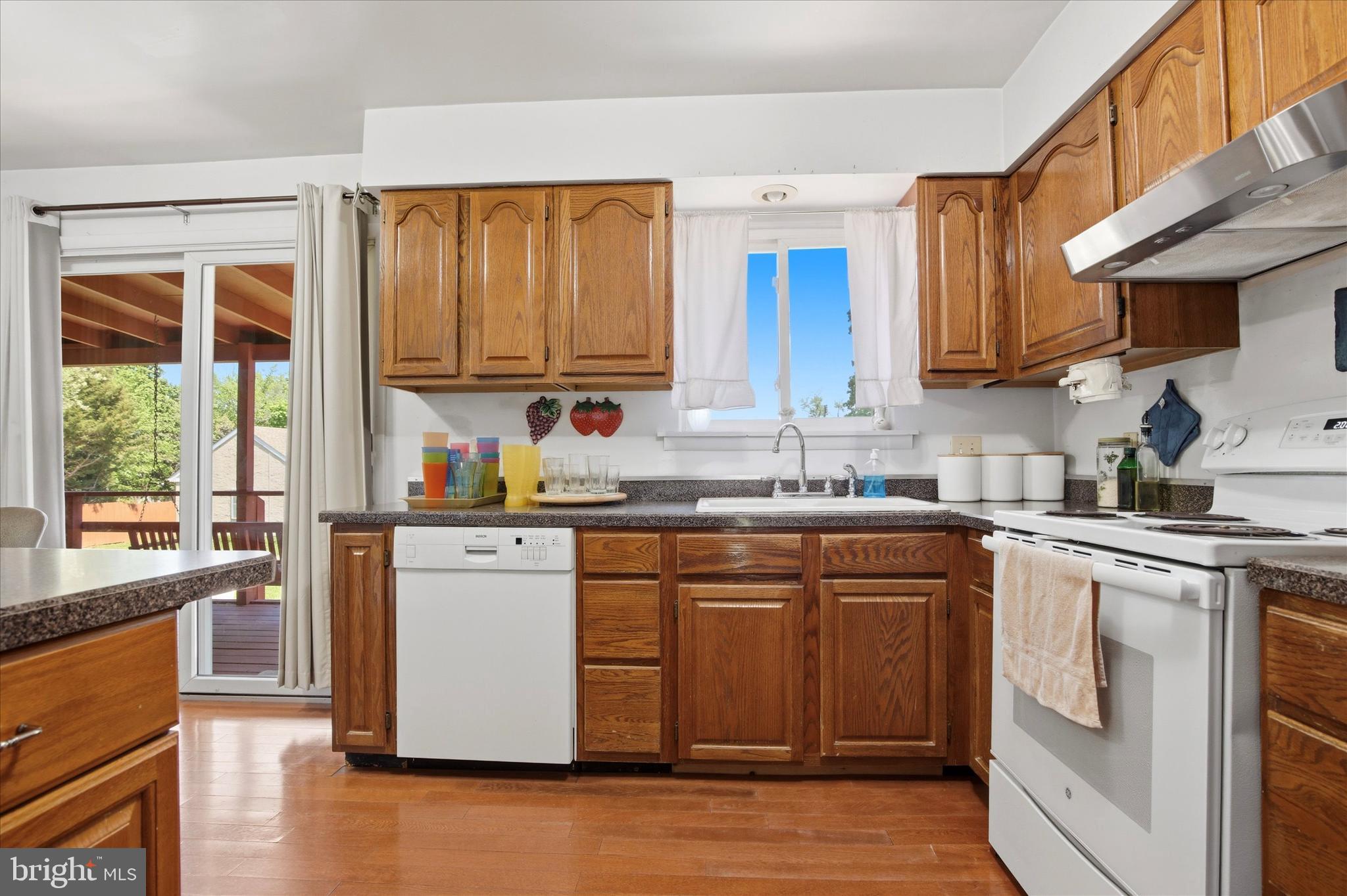 1265 Old York Road Warminster, PA 18974 - Photo 6 of 35 a kitchen with stainless steel appliances granite countertop a stove a sink dishwasher and a refrigerator