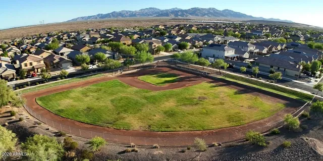 a view of an ocean with a mountain