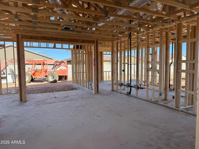 a view of an empty room with windows