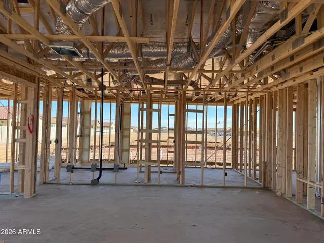 a view of a swimming pool with outdoor seating