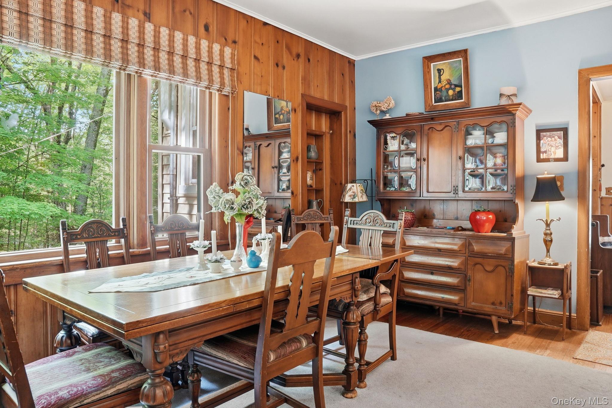 370 Starlight Road Monticello, NY 12701 - Photo 14 of 49 a dining room with furniture and a large window
