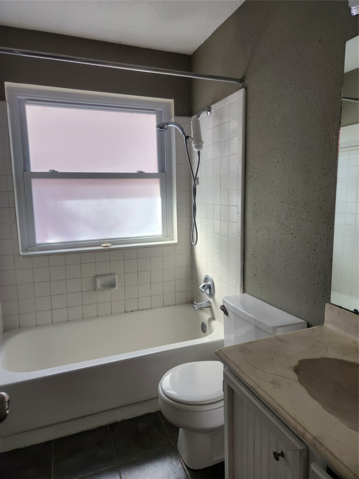 3906 Adonis Drive Spring, TX 77373 - Photo 5 of 9 a bathroom with a granite countertop sink toilet and bathtub