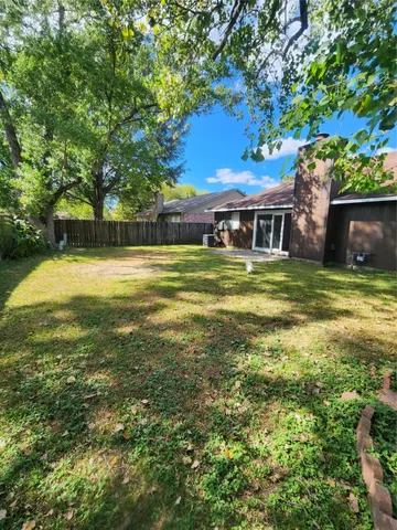 a view of house with outdoor space