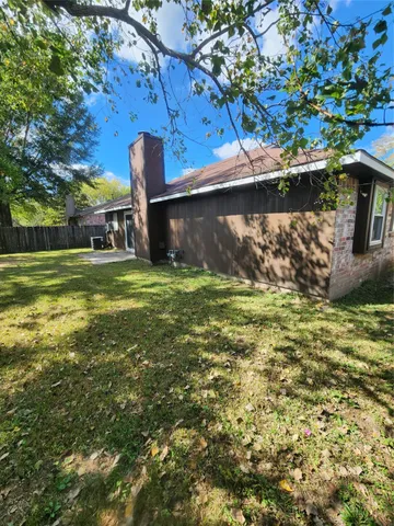 a view of a back yard of the house
