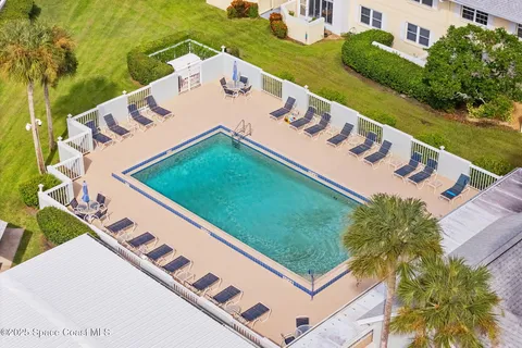 an aerial view of a swimming pool