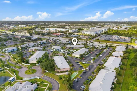 a picture of a room with a white wall and a large window