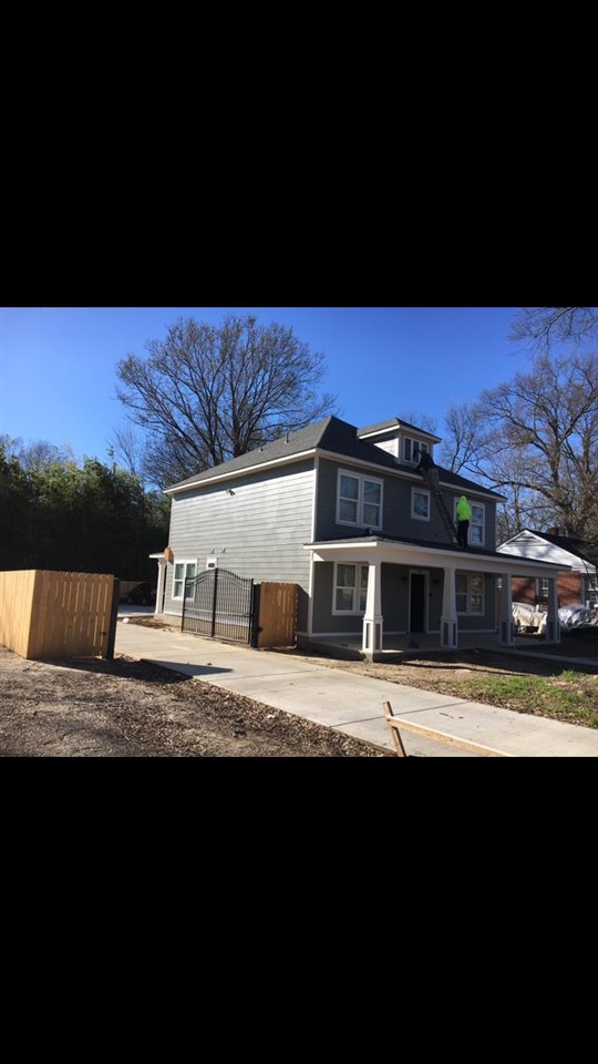 1071 Getwell Road Memphis, TN 38111 - Photo 4 of 6 a view of house with yard