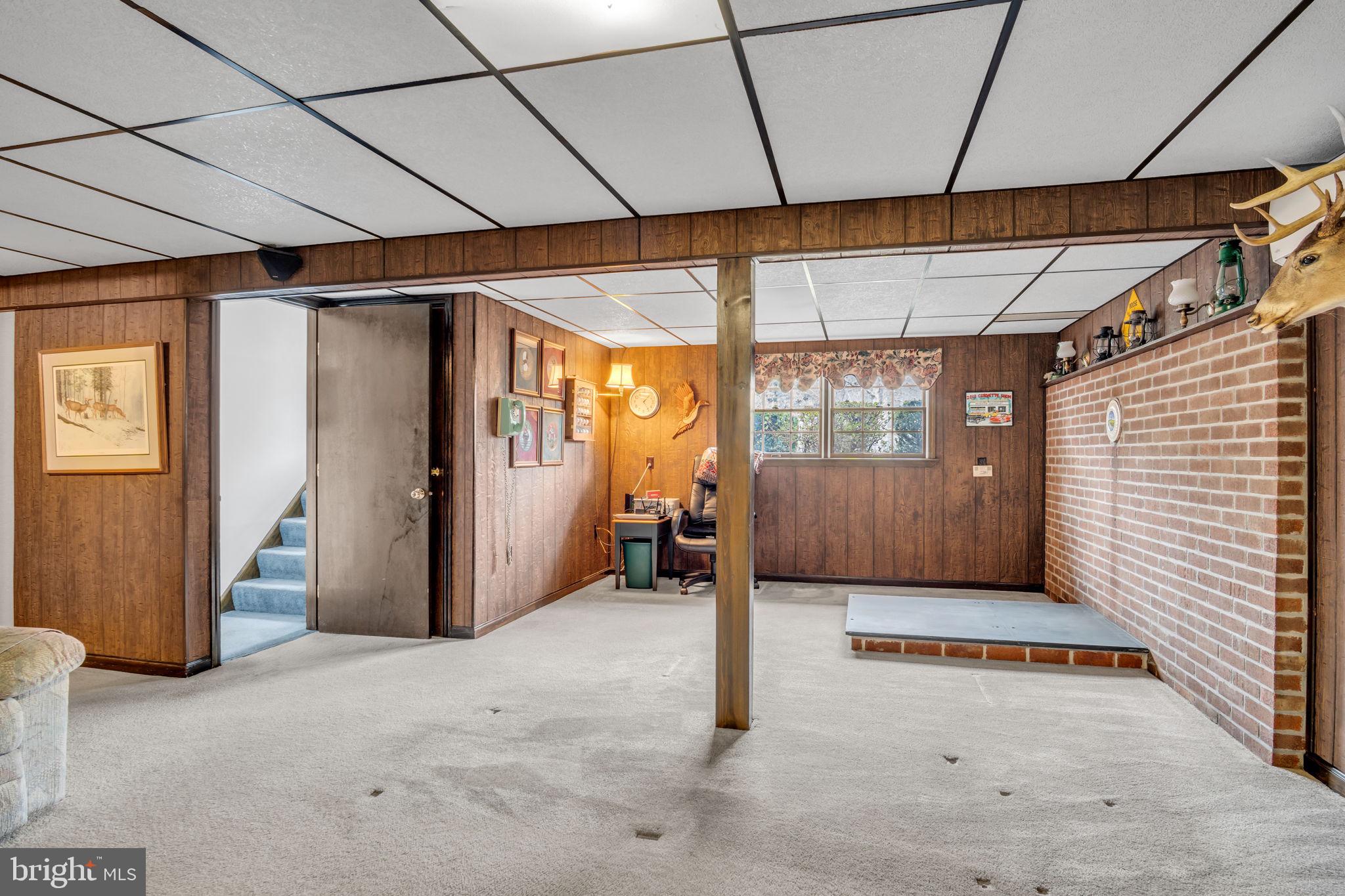 155 Greenbriar Road Elliottsburg, PA 17024 - Photo 23 of 38 Spacious basement with rustic charm.
