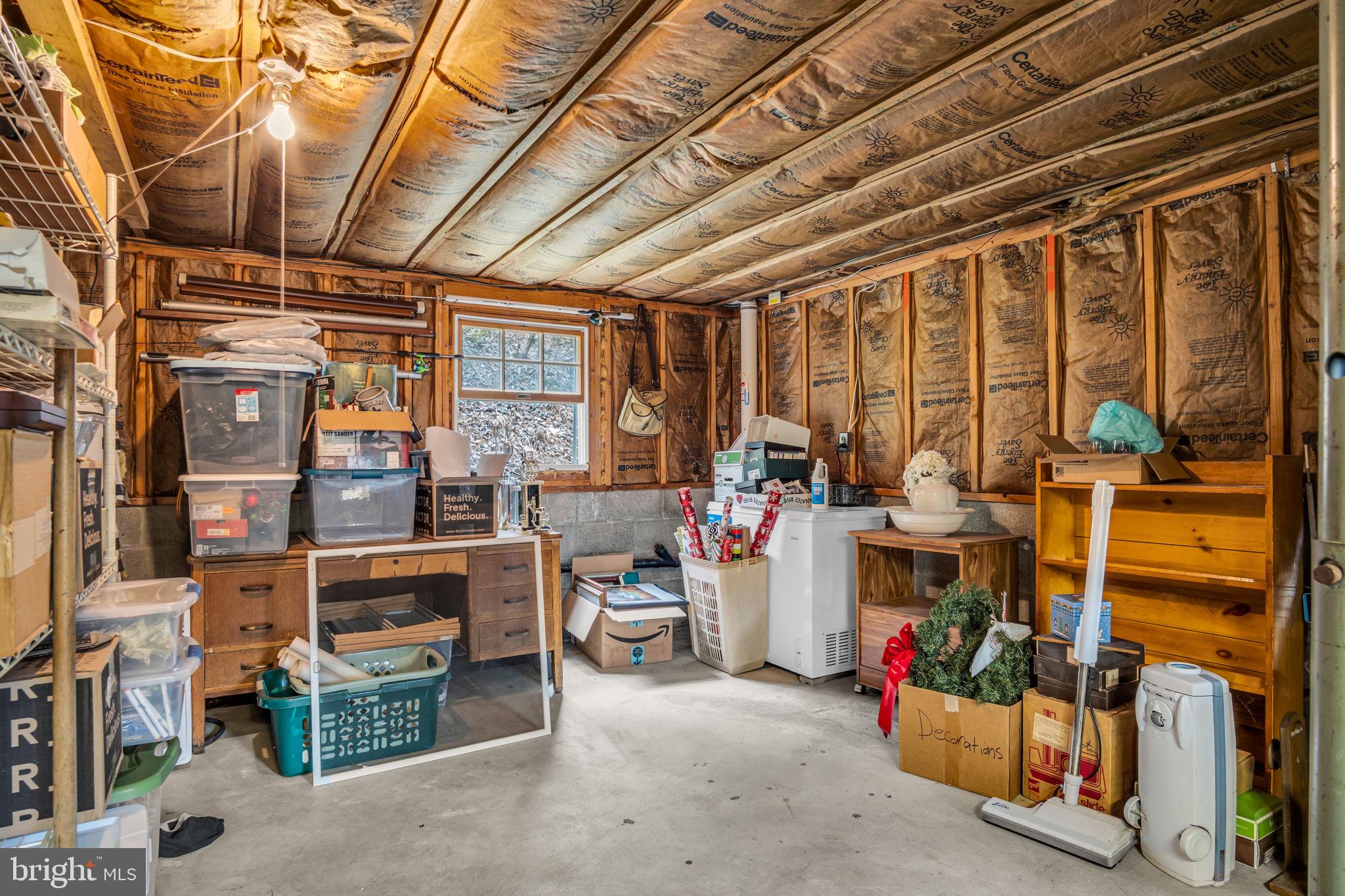 155 Greenbriar Road Elliottsburg, PA 17024 - Photo 27 of 38 Spacious garage with ample storage.