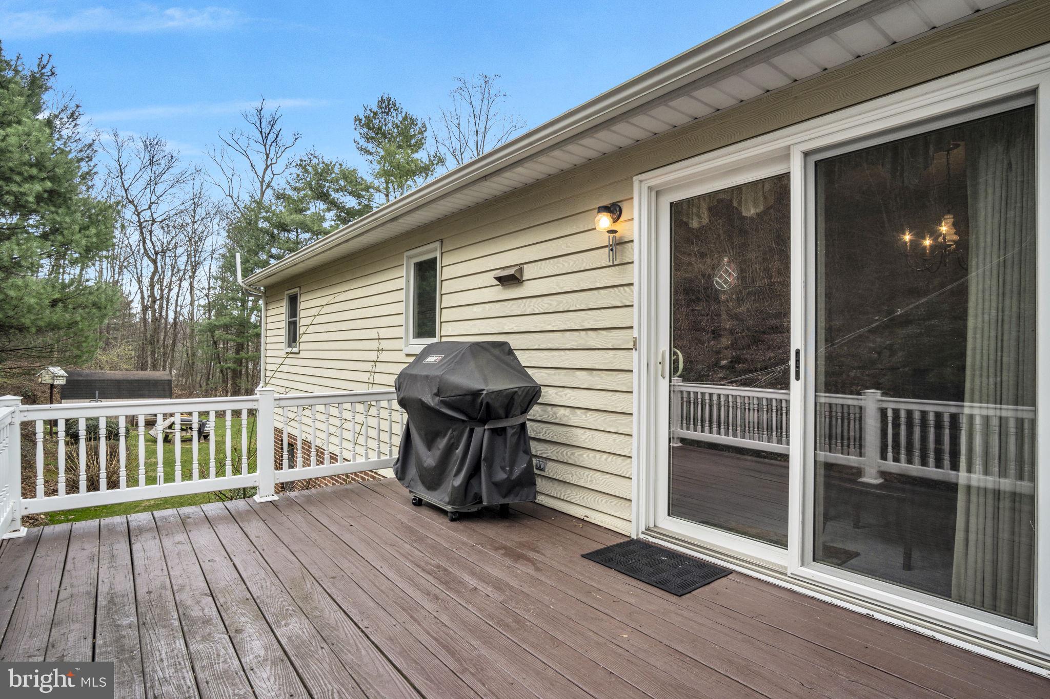 155 Greenbriar Road Elliottsburg, PA 17024 - Photo 29 of 38 Charming deck with serene woodland views.
