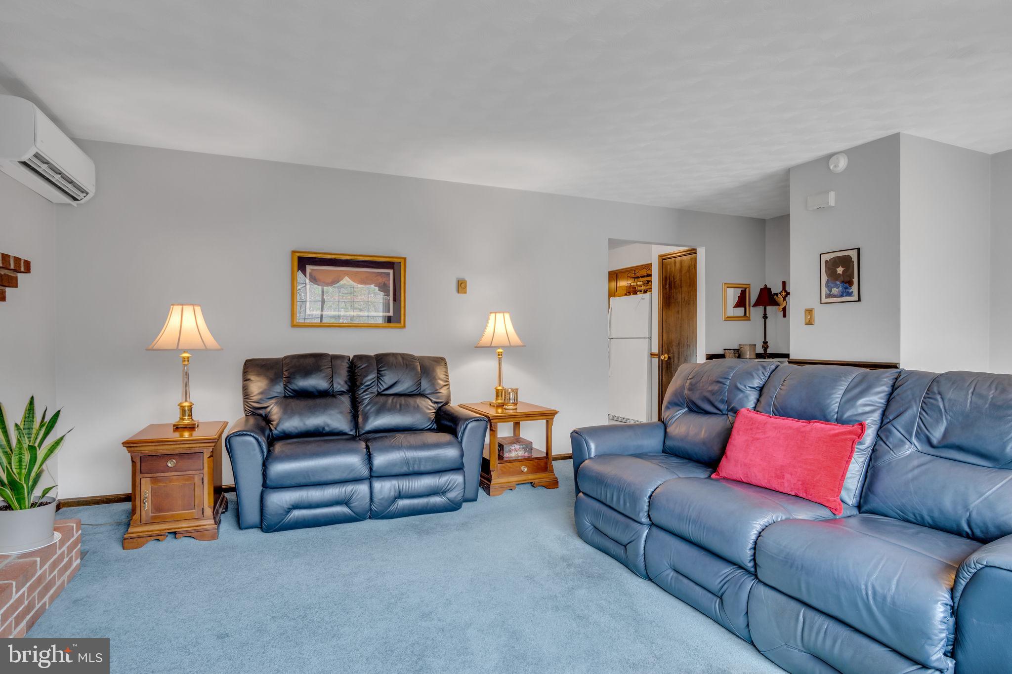 155 Greenbriar Road Elliottsburg, PA 17024 - Photo 7 of 38 Cozy living space with inviting charm.