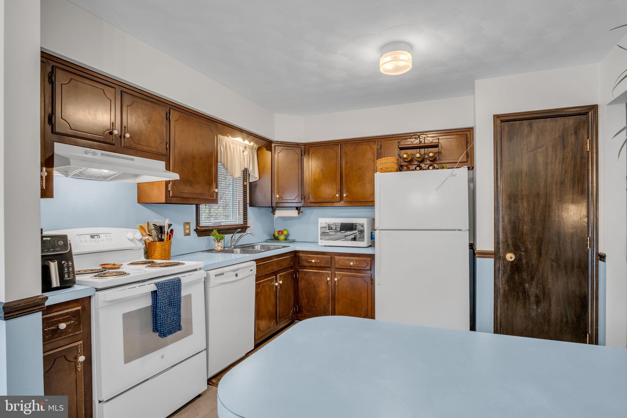 155 Greenbriar Road Elliottsburg, PA 17024 - Photo 10 of 38 Charming kitchen with classic wood accents.