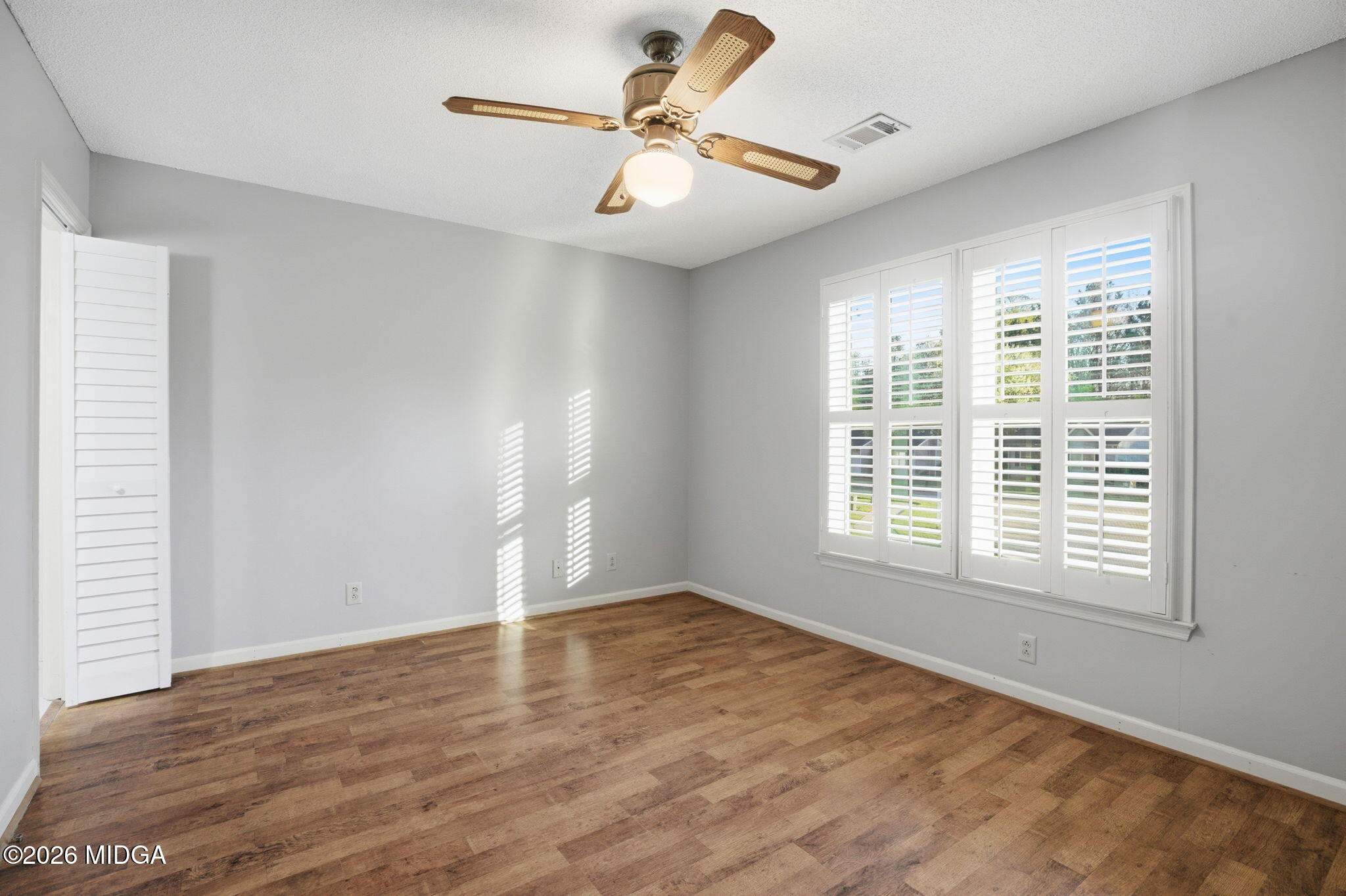 108 Manor Terrace Macon, GA 31210 - Photo 15 of 23 a view of an empty room with a window