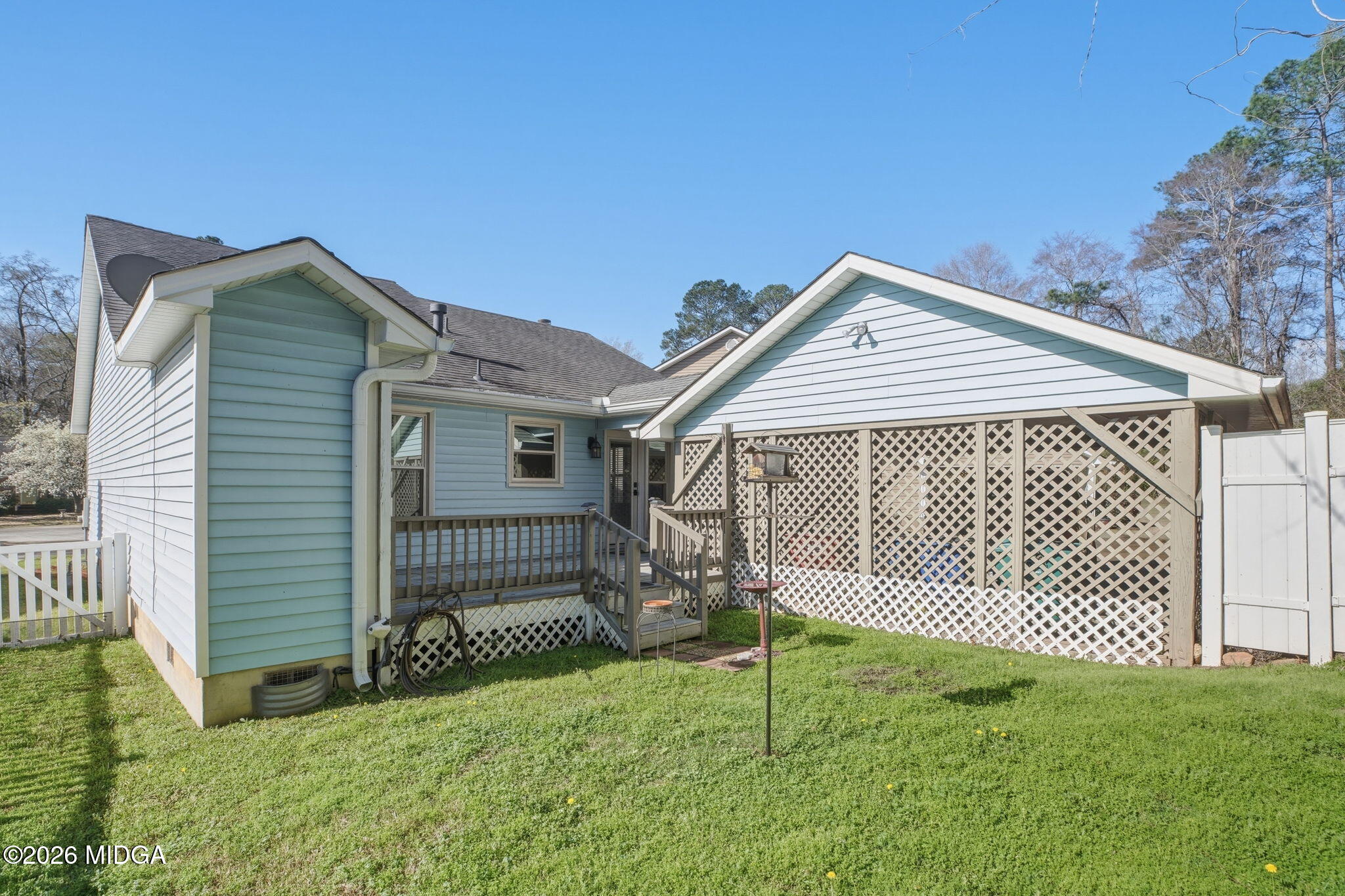 108 Manor Terrace Macon, GA 31210 - Photo 19 of 23 a front view of a house with a garden