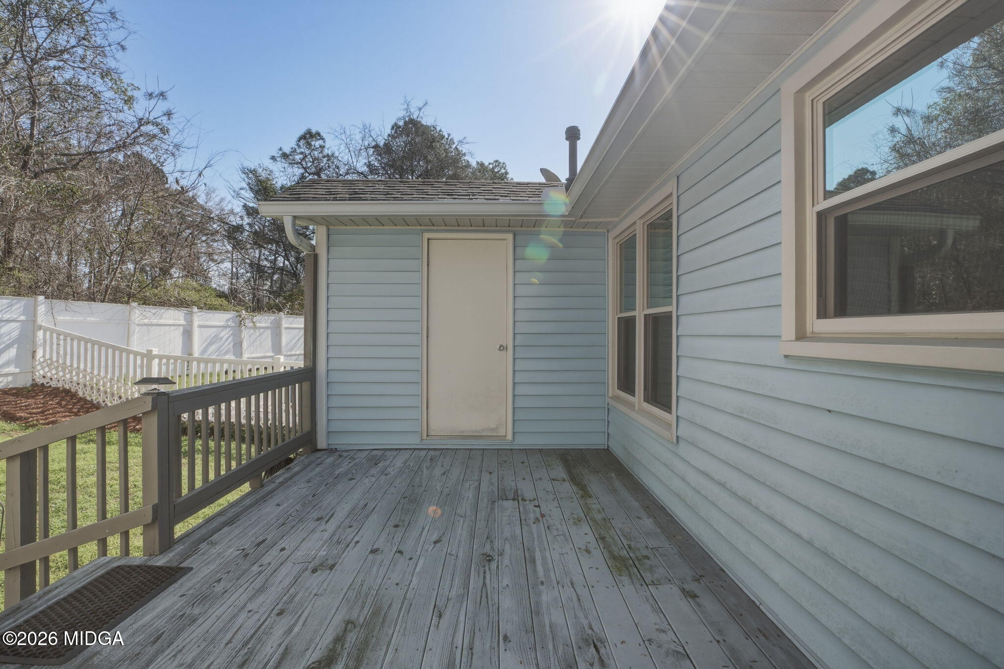 108 Manor Terrace Macon, GA 31210 - Photo 21 of 23 a view of a deck with wooden floor and fence