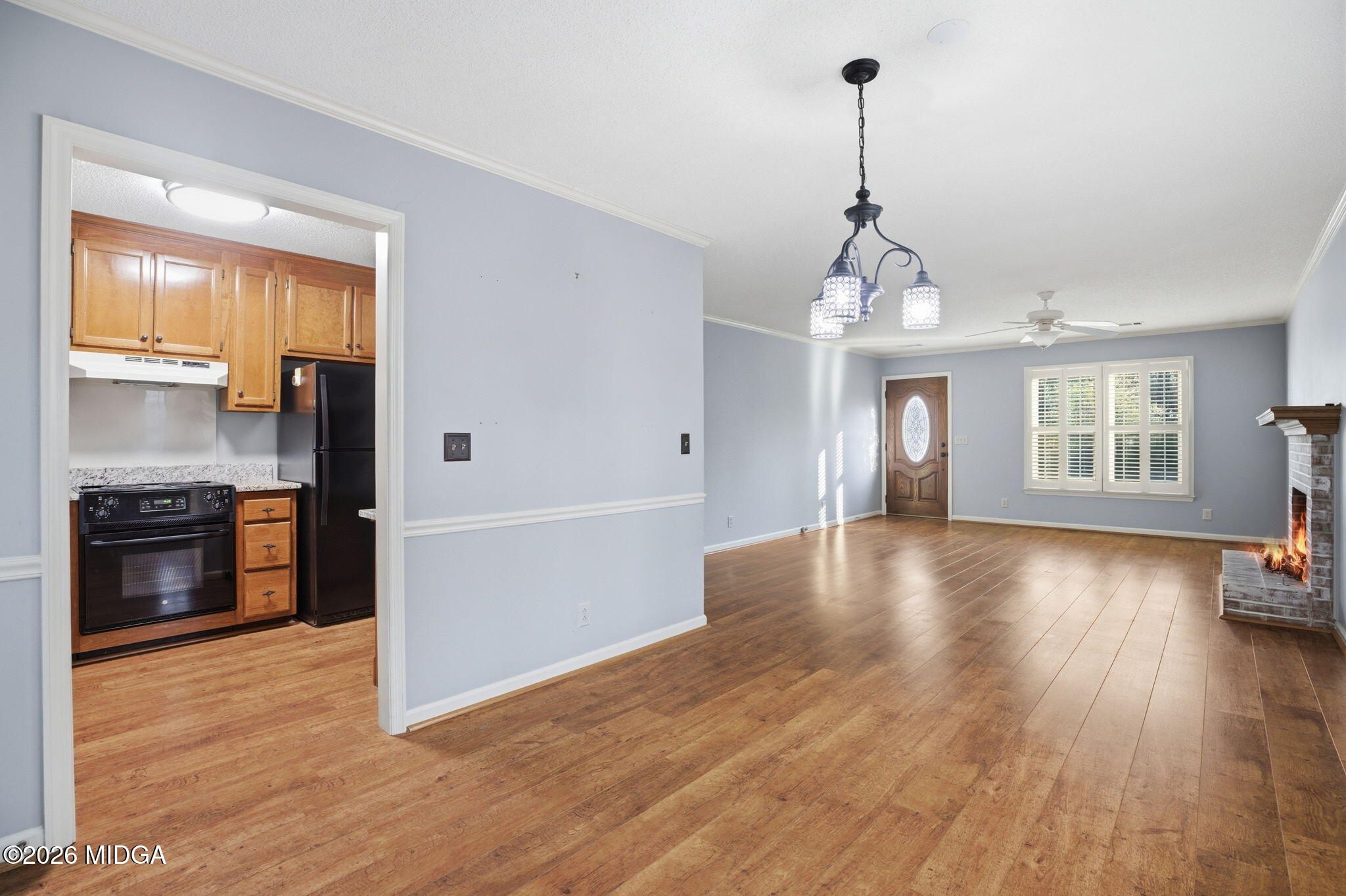 108 Manor Terrace Macon, GA 31210 - Photo 5 of 23 a view of a room window and wooden floor