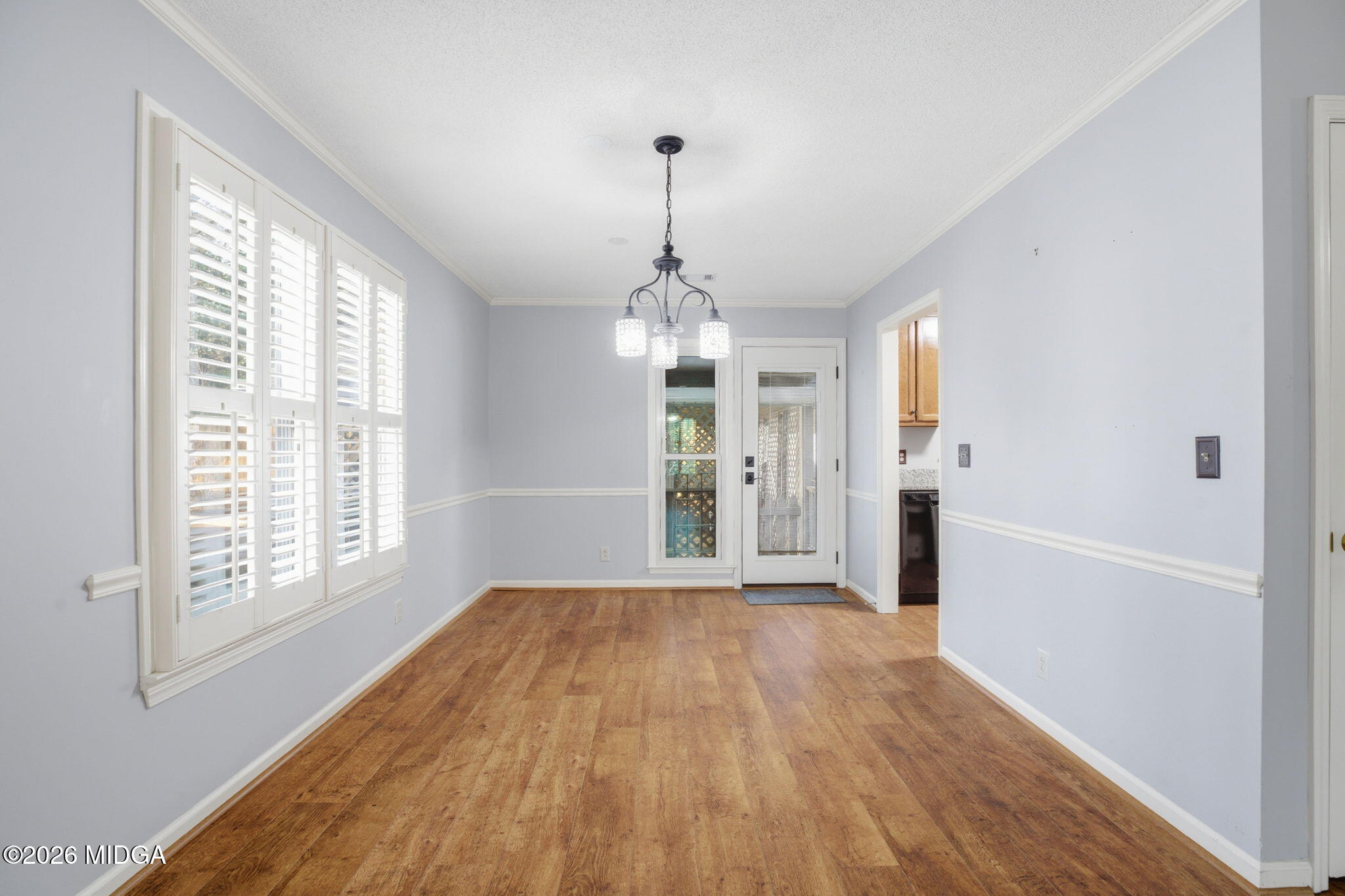108 Manor Terrace Macon, GA 31210 - Photo 6 of 23 a view of livingroom with hardwood floor and window