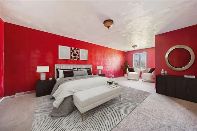 a large bathroom with a toilet a sink and a mirror