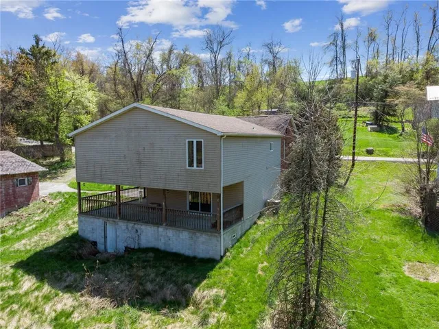 a view of backyard with green space