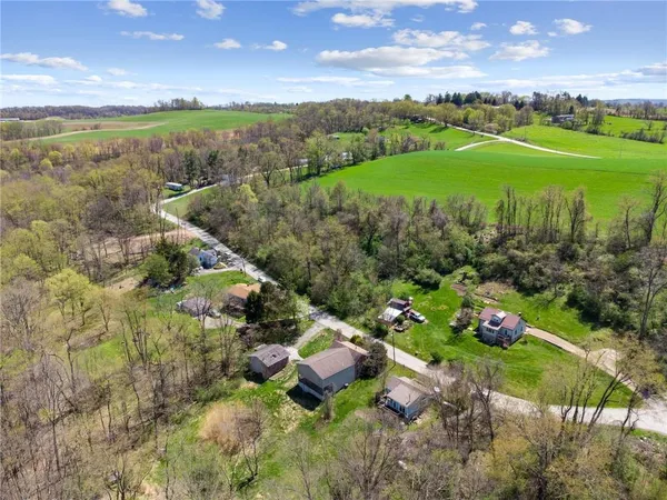 a view of a lake with a yard