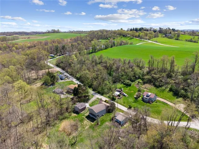 a view of a lake with a yard