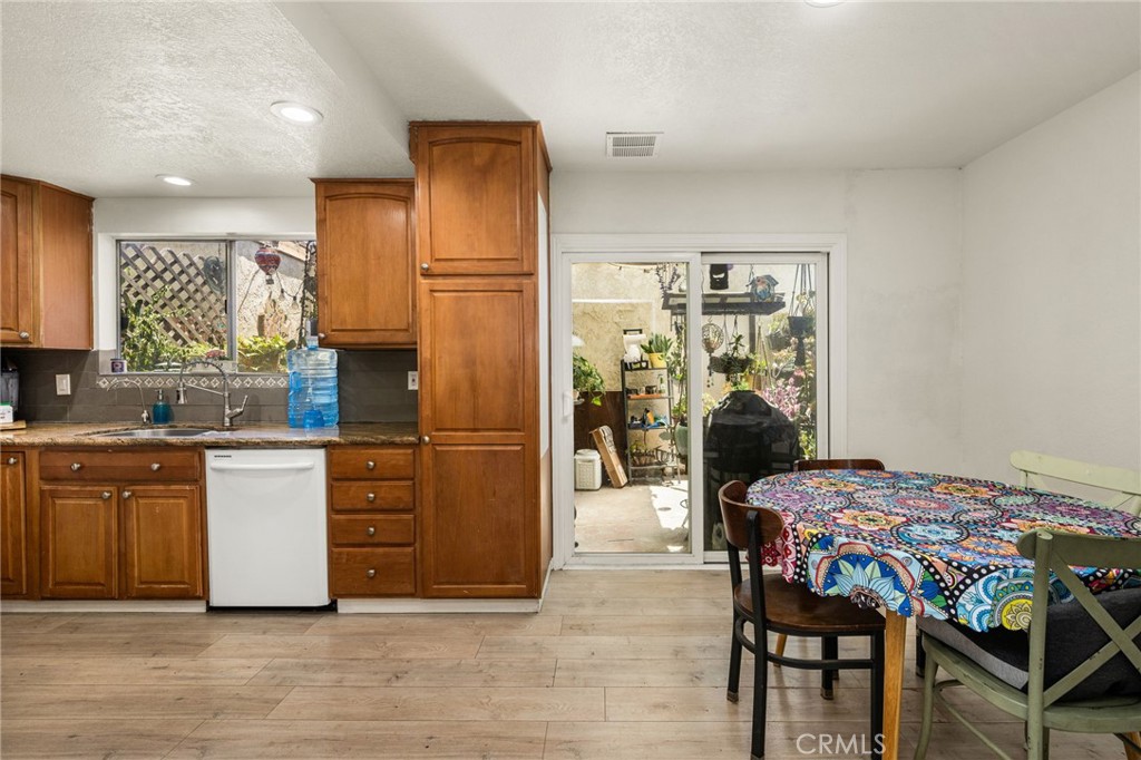 7381 Katella Avenue Stanton, CA 90680 - Photo 6 of 21 kitchen/dining/patio