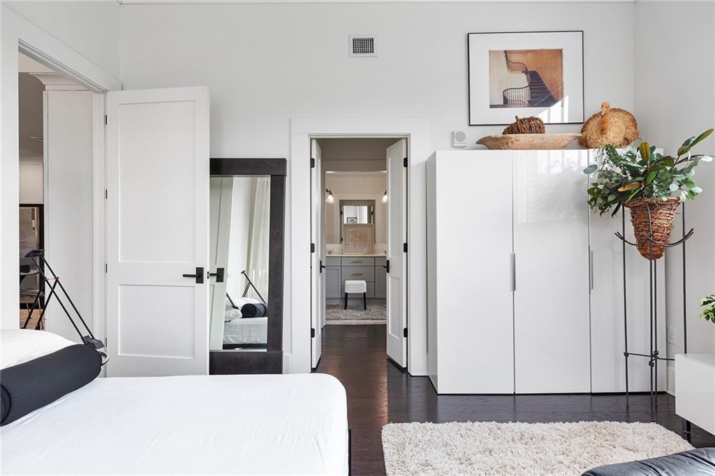 10625 Serenbe Lane, Unit 204 Chattahoochee Hills, GA 30268 - Photo 14 of 20 a living room with furniture and a potted plant