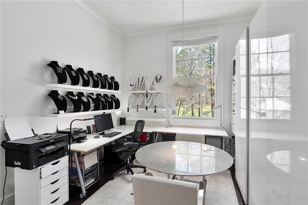 10625 Serenbe Lane, Unit 204 Chattahoochee Hills, GA 30268 - Photo 18 of 20 a kitchen with a cabinets and stove