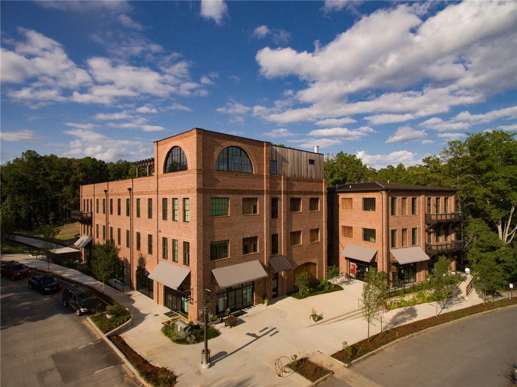 10625 Serenbe Lane, Unit 204 Chattahoochee Hills, GA 30268 - Photo 20 of 20 a view of a house with wooden fence