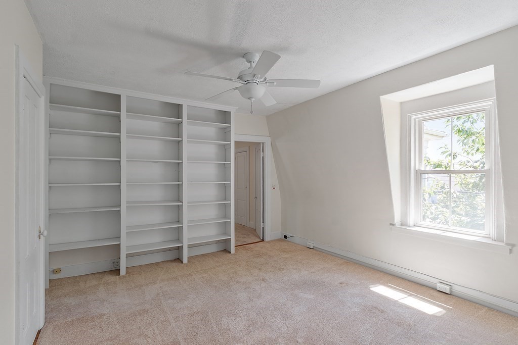 84 A Granite Street, Unit A Rockport, MA 01966 - Photo 13 of 40 a view of an empty room with a window