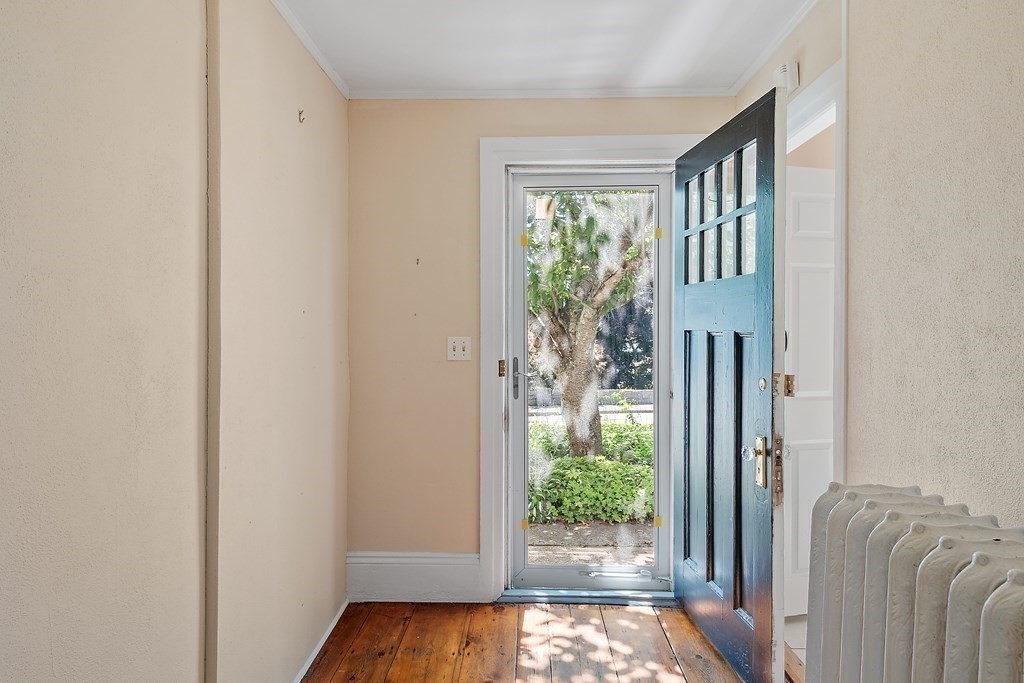84 A Granite Street, Unit A Rockport, MA 01966 - Photo 3 of 40 a view of hallway with furniture and a window