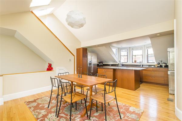 38 Worcester Street, Unit 3 Boston, MA 02118 - Photo 3 of 15 a dining area with a table and chairs