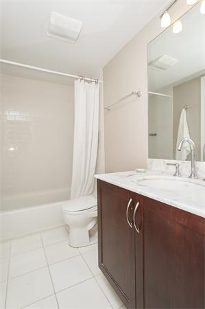 38 Worcester Street, Unit 3 Boston, MA 02118 - Photo 10 of 15 a bathroom with a sink a toilet and a shower