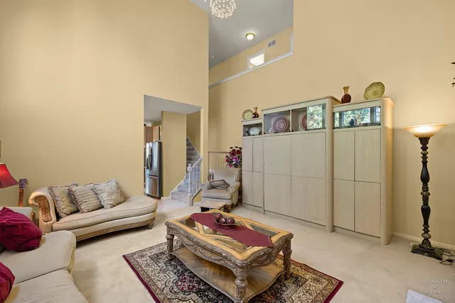 a living room with furniture and a couch