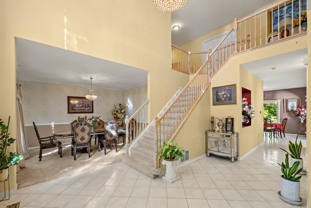 a view of hall way with furniture