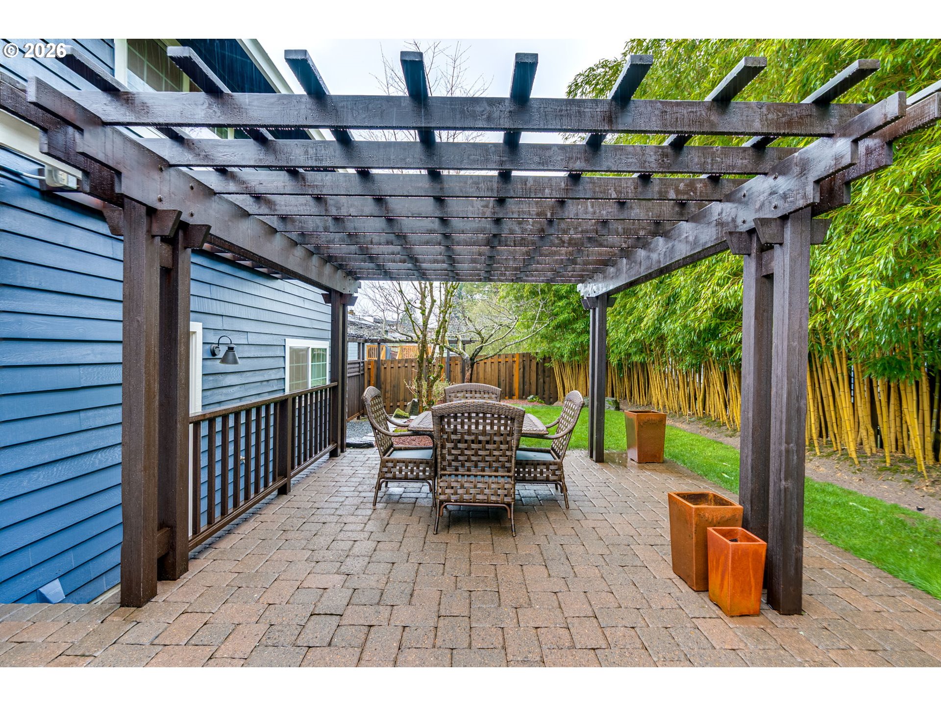 18370 Franklin Way Gladstone, OR 97027 - Photo 40 of 45 a backyard of a house with barbeque oven table and chairs