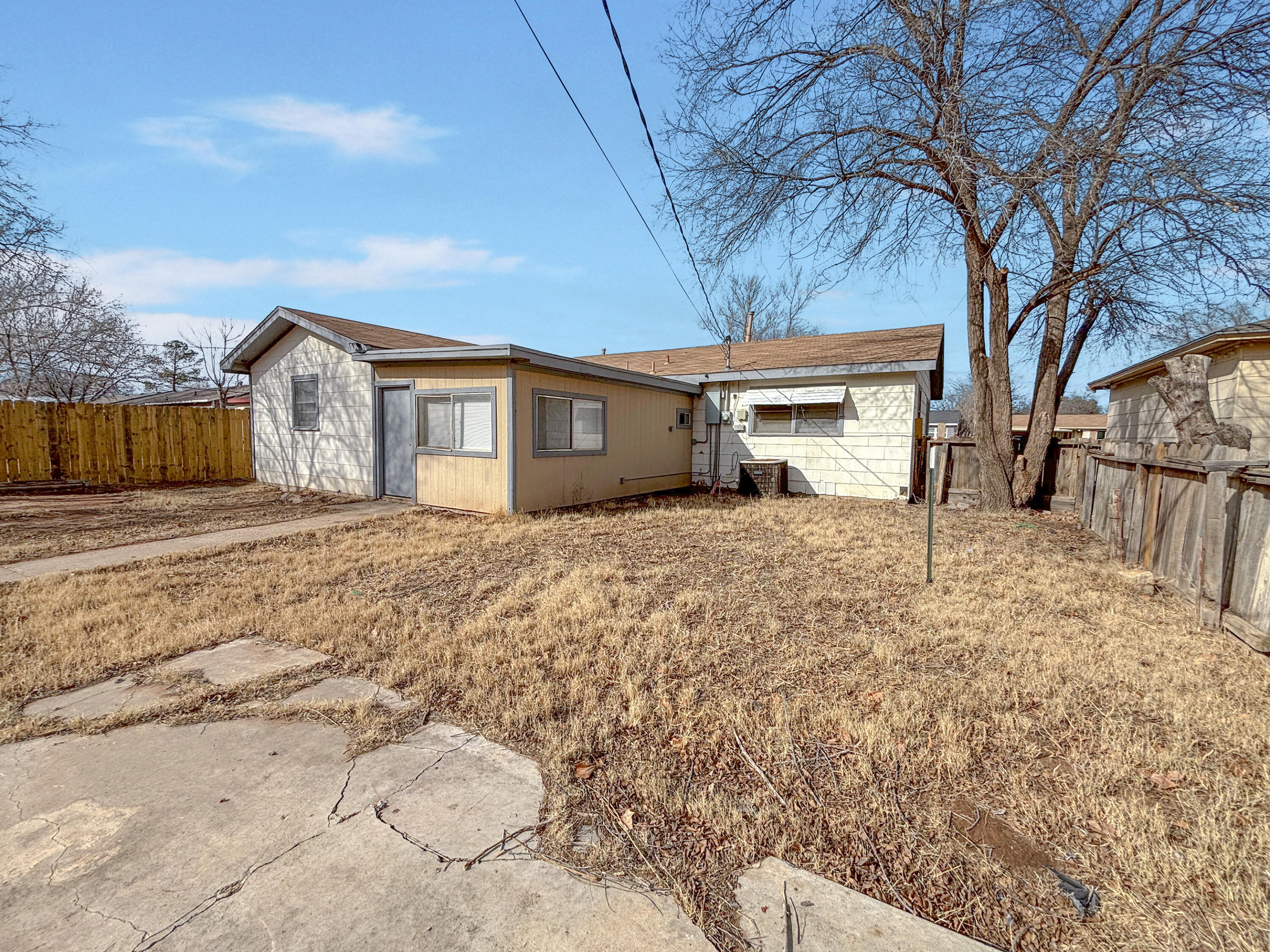 4411 45th Street Lubbock, TX 79414 - Photo 42 of 44 a view of a house with a yard