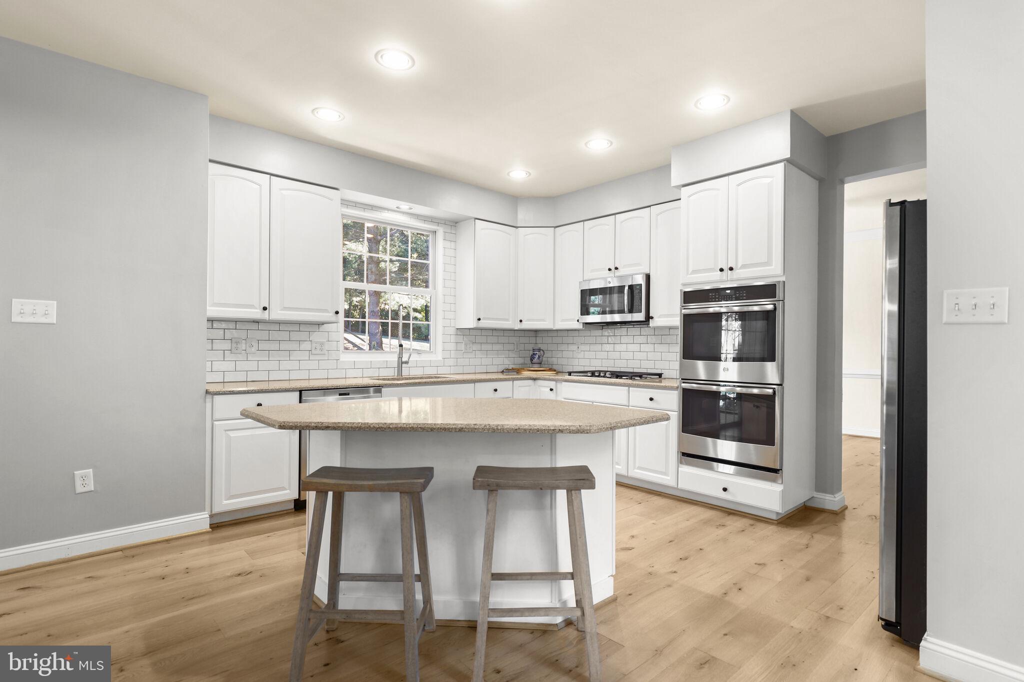 5911 Fall Moon Ride Clarksville, MD 21029 - Photo 15 of 65 Kitchen with granite countertops