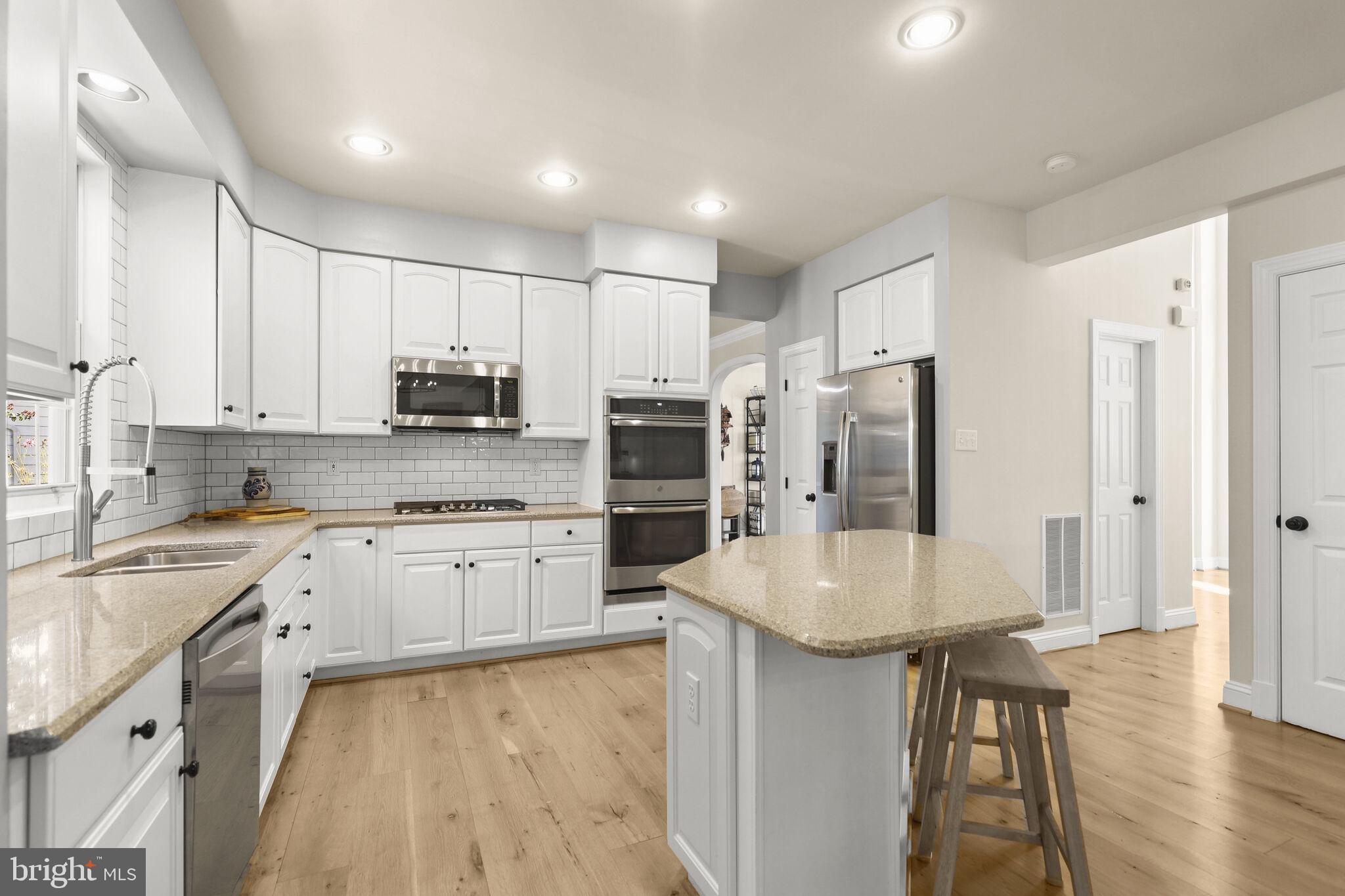 5911 Fall Moon Ride Clarksville, MD 21029 - Photo 16 of 65 Kitchen features entertainers island